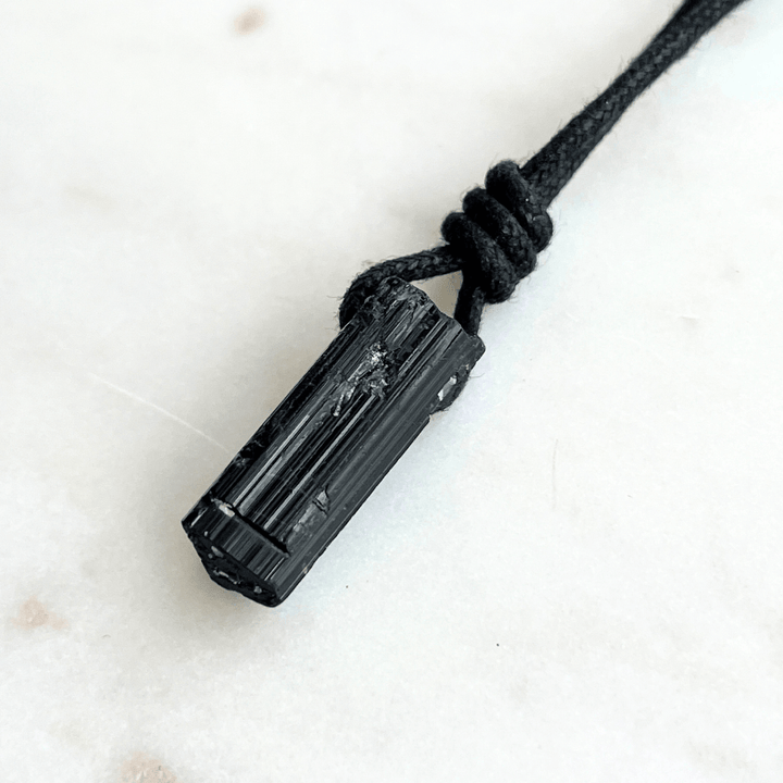 Raw Black Tourmaline OOAK Point Pendant Cord Necklace - A symbol of grounding and vitality by Luck Strings.