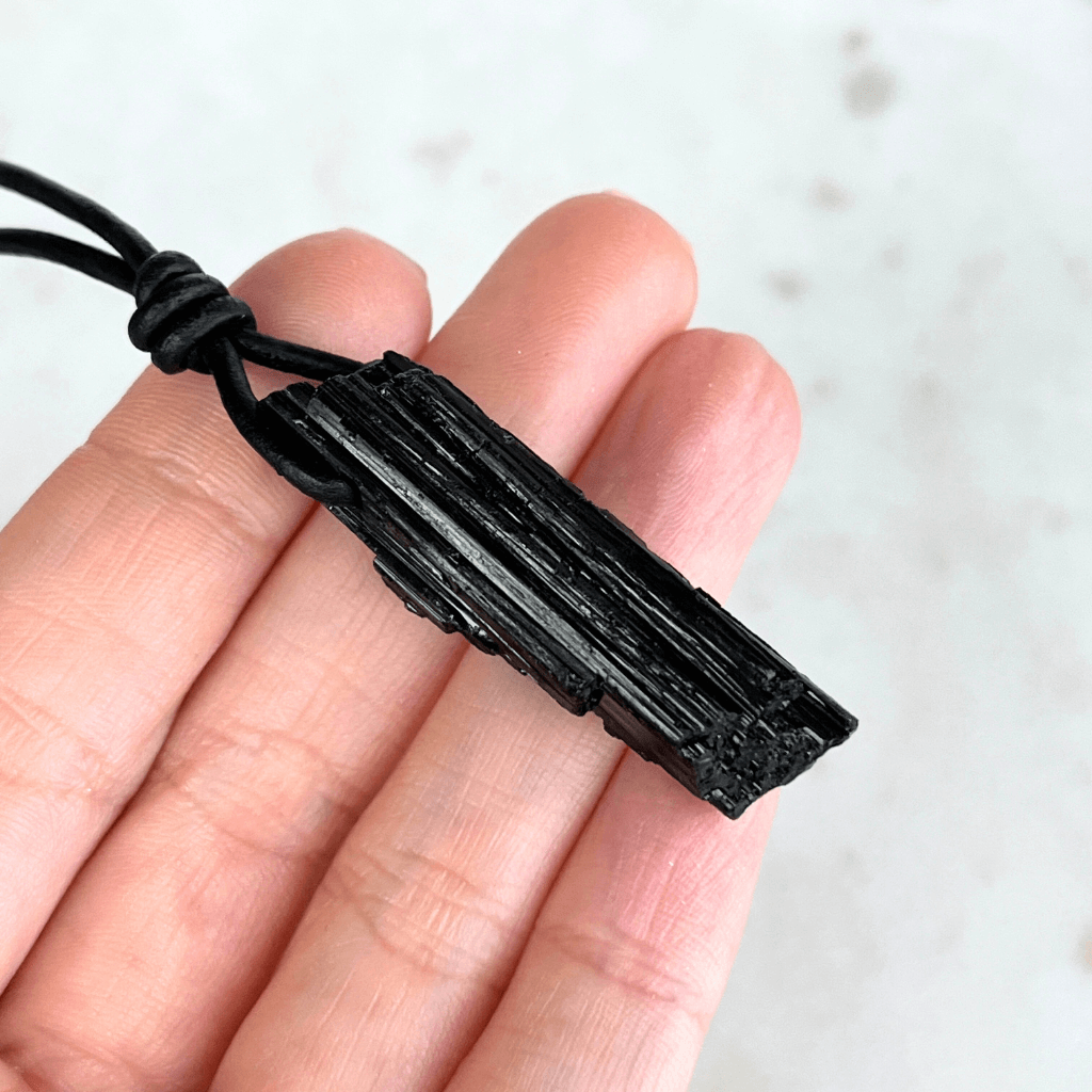 Natural Raw Black Tourmaline Pendant - A grounding and balancing symbol by Luck Strings.