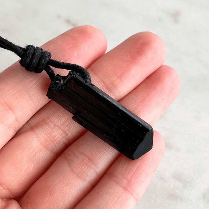 Raw Black Tourmaline OOAK Point Pendant Necklace - A symbol of grounding and resilience by Luck Strings.