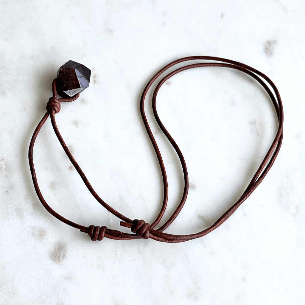 Geometric Garnet Hexagon Pendant - A symbol of love, strength, and elegance by Luck Strings.