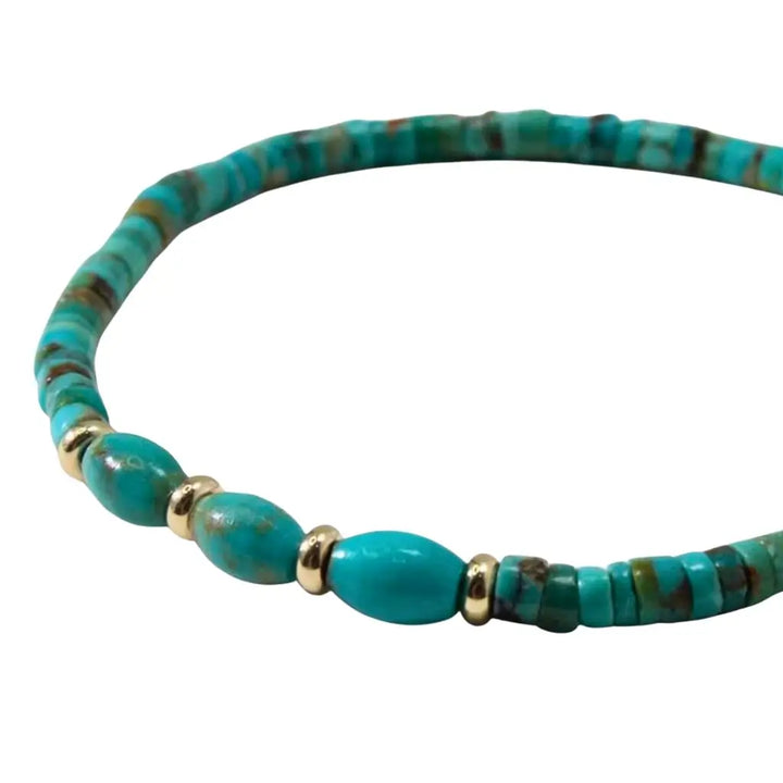 Genuine turquoise heishi and solid gold bracelet with rondelle accents, minimalist jewelry design. Luck Strings