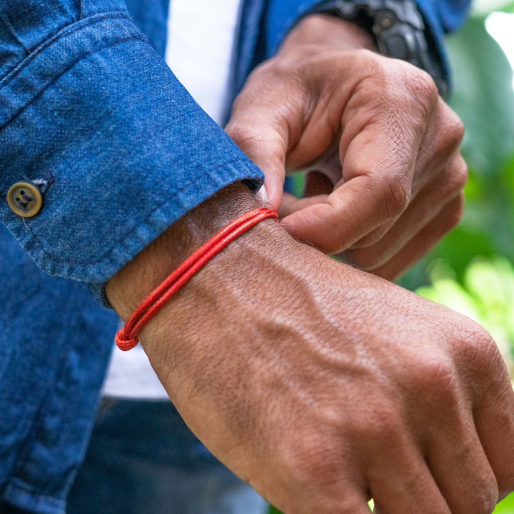 Thin red bracelet shop