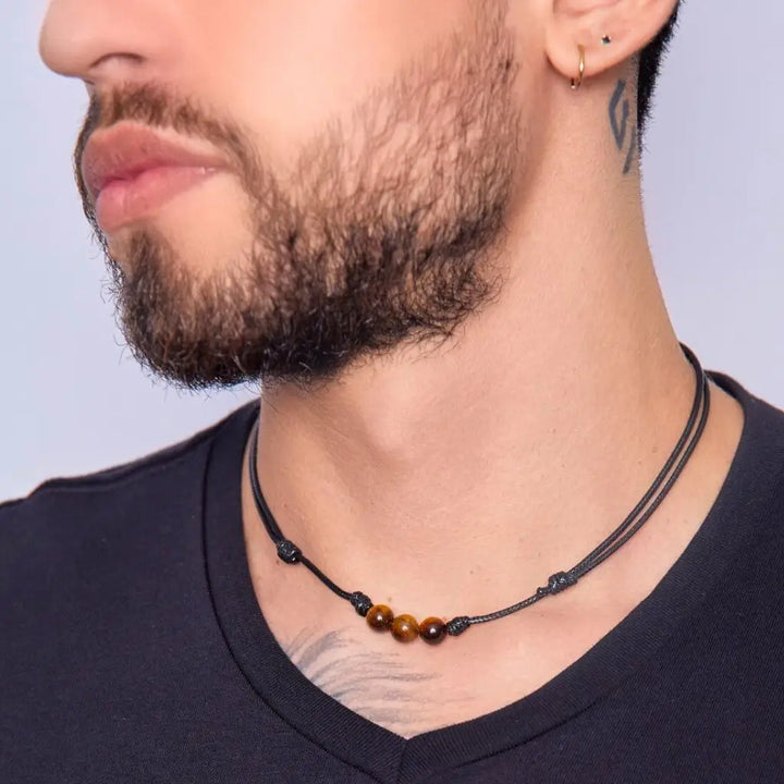 Men showcasing a Tiger Eye Choker, with the stone's distinctive golden-brown shimmer accentuating their stylish and confident look - Luck Strings