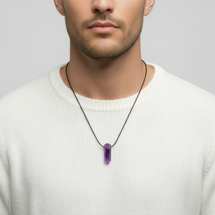 amethyst point pendant necklace on a man