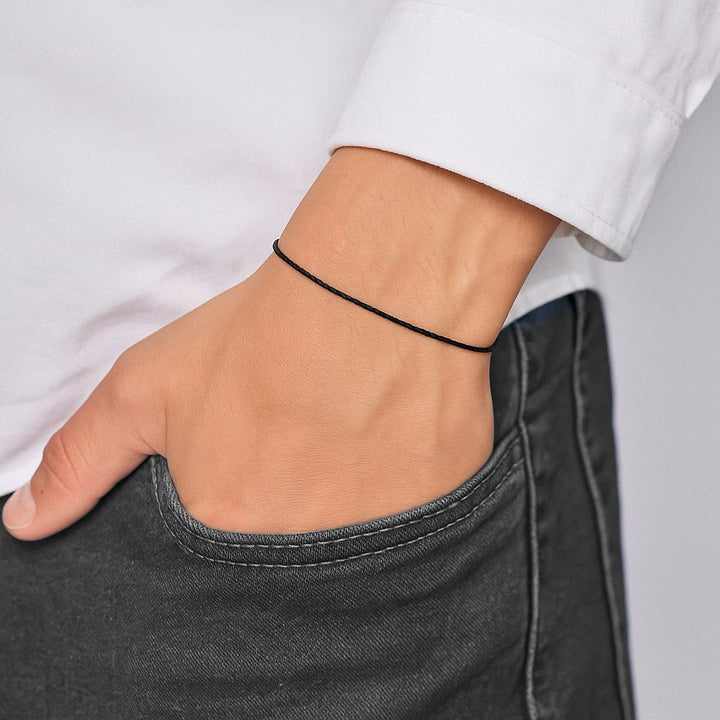 Man Wearing Adjustable Nylon Black String Bracelet 14K Gold by Luck Strings