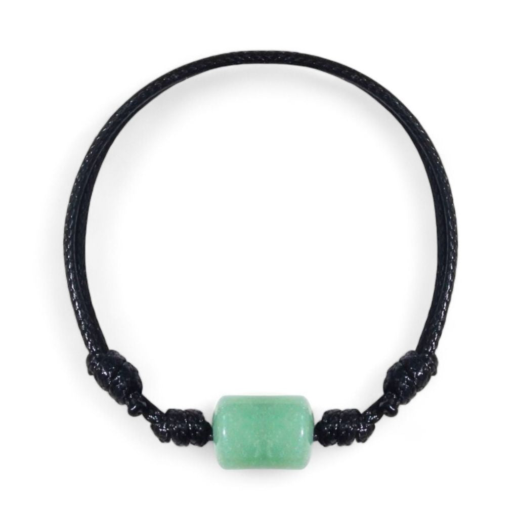 Green aventurine stone bracelet on black waxed cord, isolated product view.
