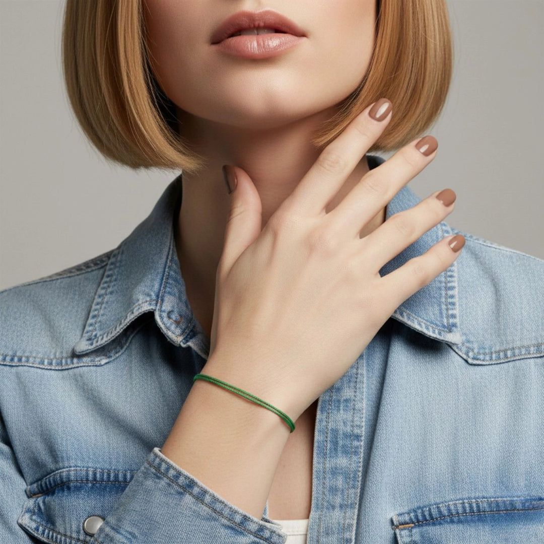Person wearing a denim jacket with a blurred background