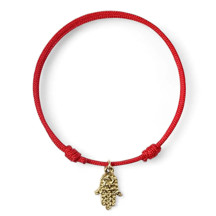 Adjustable gold vermeil Hamsa bracelet symbolizing protection and luck. Luck Strings