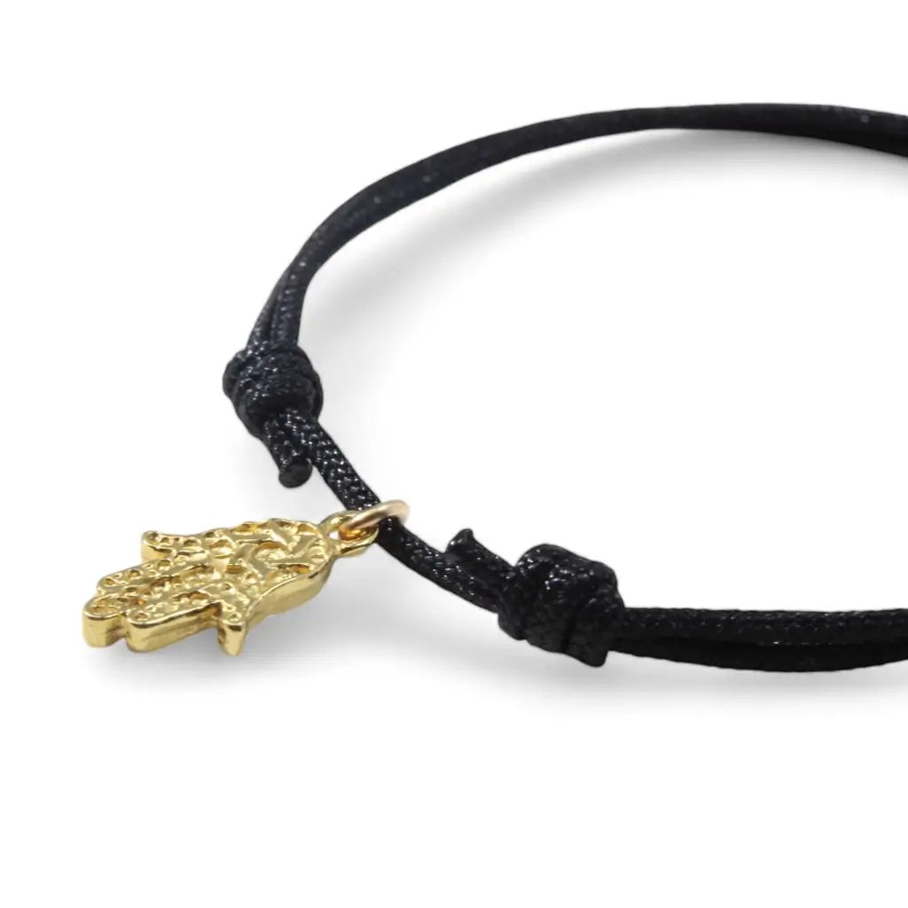 Adjustable gold vermeil Hamsa bracelet symbolizing protection and luck. Luck Strings