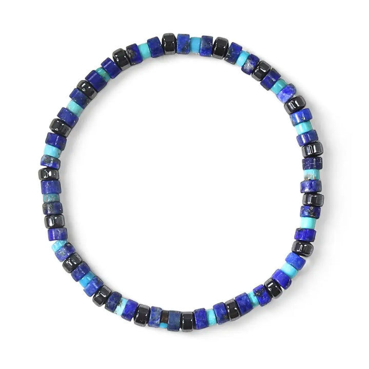 Stretch bracelet with 4mm lapis lazuli, 3mm turquoise, and hematite beads, featuring natural gemstone accents. Luck Strings