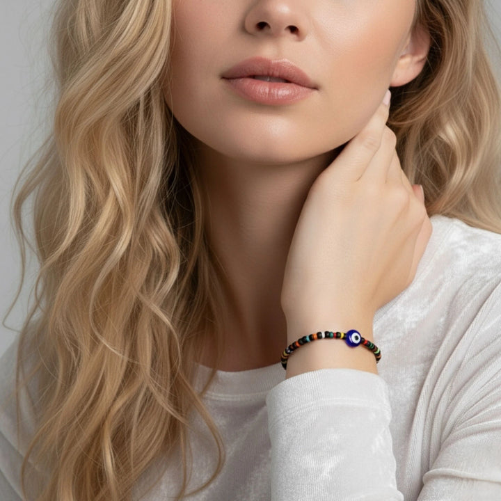 Woman wearing a colorful beaded bracelet on her wrist