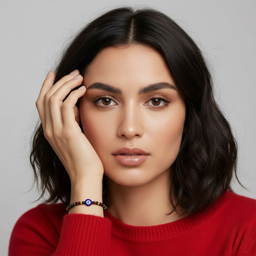 Woman wearing a red sweater with a gray background
