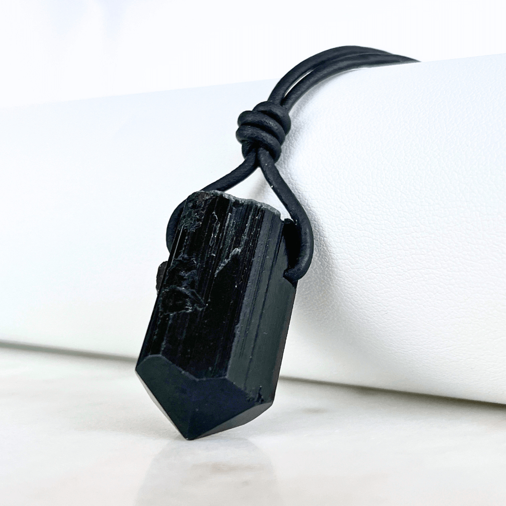 Raw Black Tourmaline Charm Necklace - A symbol of protection and positivity by Luck Strings.