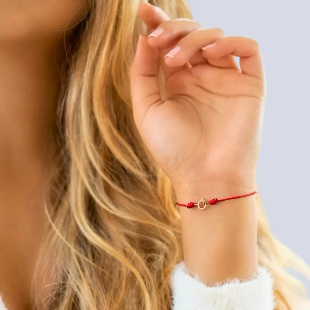 Woman Wearing Adjustable Nylon Red String Bracelet 14K Gold by Luck Strings