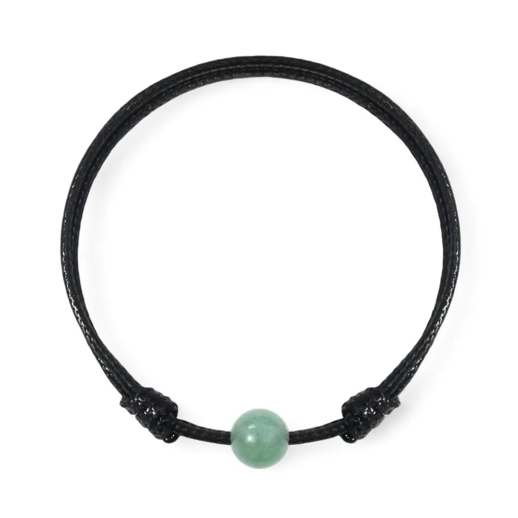 Smooth green aventurine single bead bracelet on black waxed nylon cord, isolated product view.
