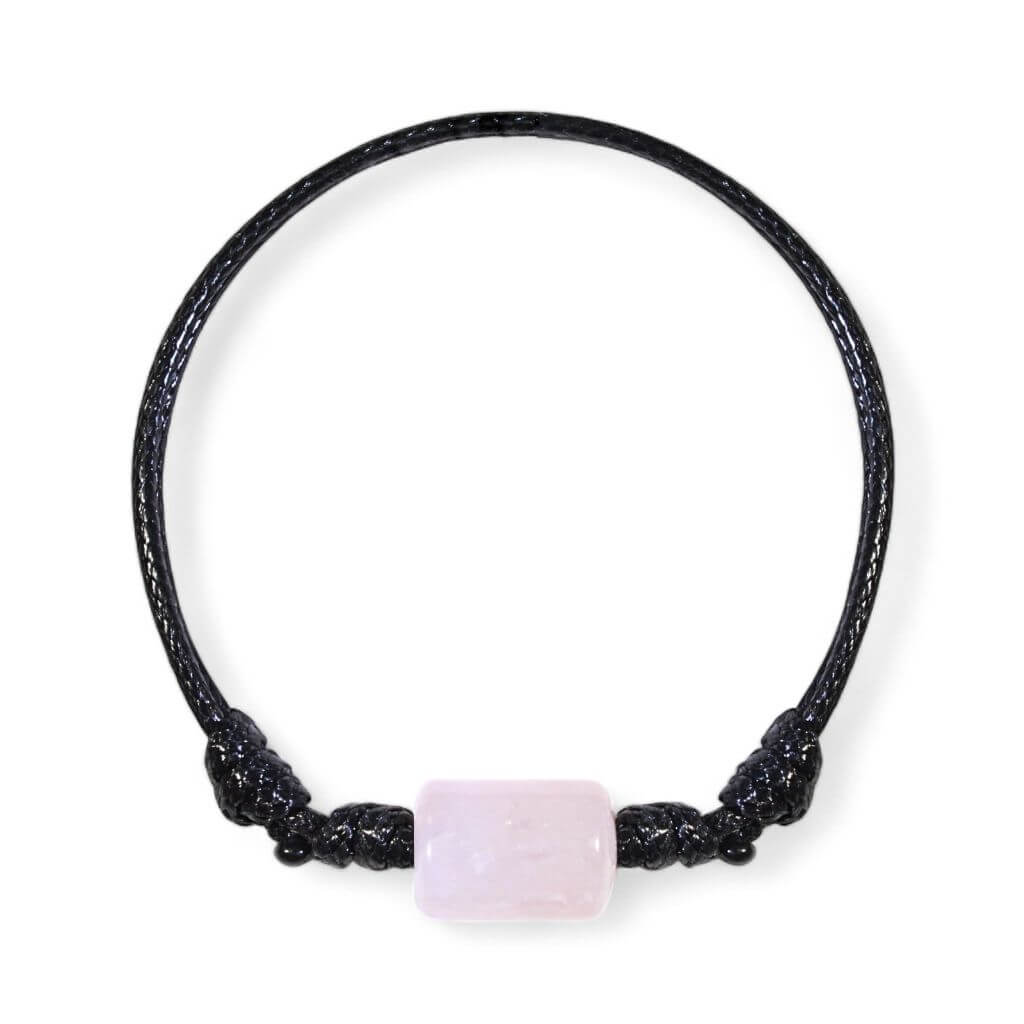 Smooth rose quartz cylinder bead bracelet on black waxed nylon cord.