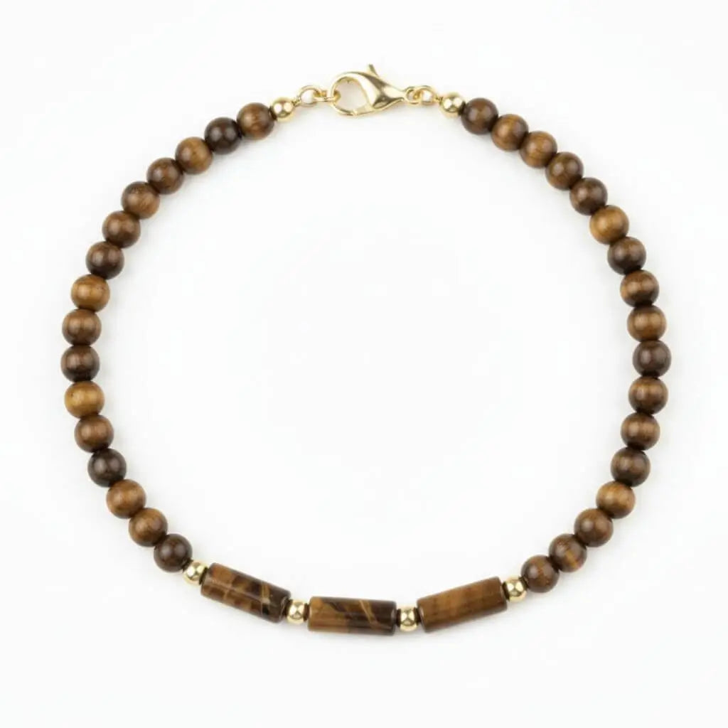 14K gold clasp Tiger’s Eye beaded bracelet laid flat on white background, premium handmade jewelry.