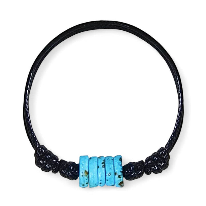 Adjustable turquoise bone bead bracelet on black cord, isolated product view.
