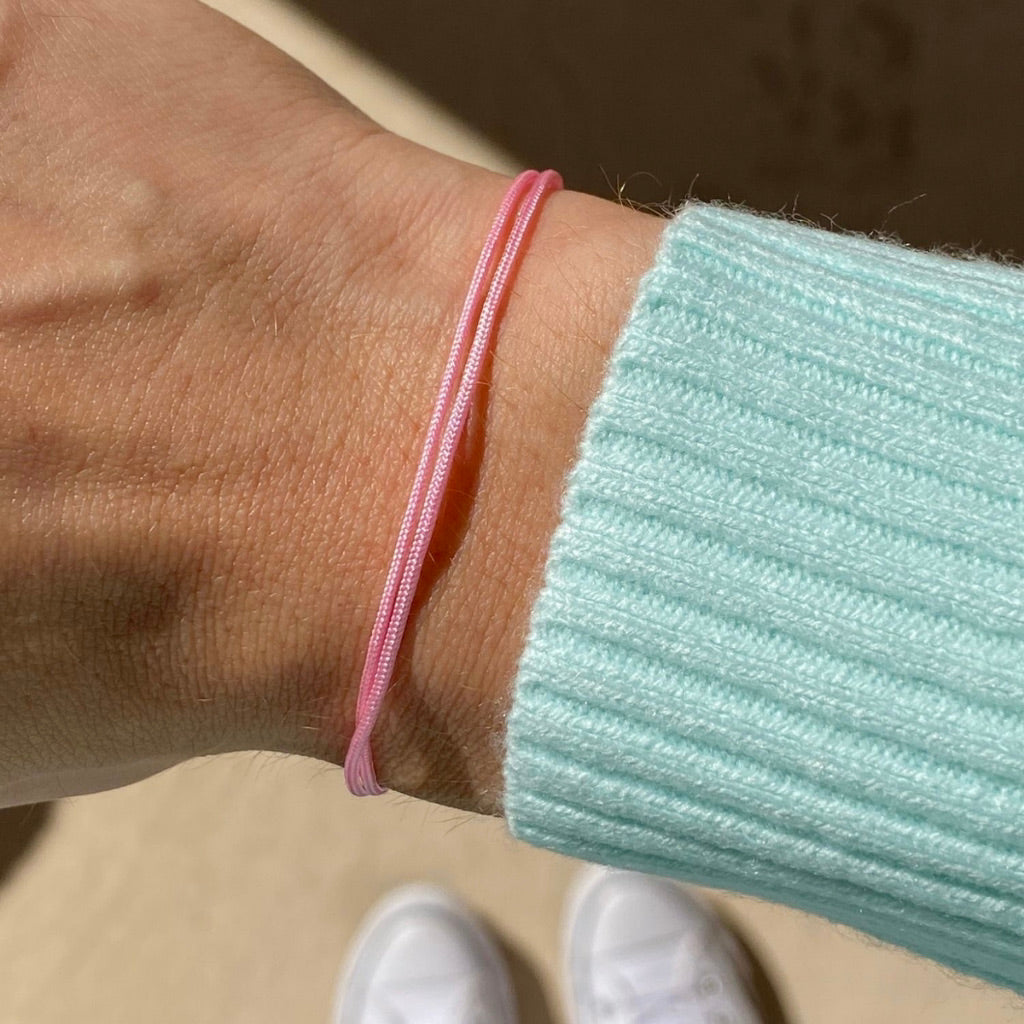 Pink string bracelet store